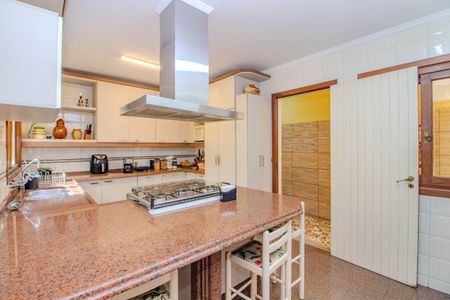 Casa à venda com 252m², 4 quartos e 2 vagas Casa à venda com 252m², 4 quartos e 2 vagasCozinha