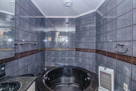 Casa à venda com 252m², 4 quartos e 2 vagas Casa à venda com 252m², 4 quartos e 2 vagasBanheiro da Suíte