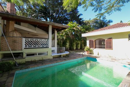 Casa à venda com 412m², 4 quartos e 6 vagas Casa à venda com 412m², 4 quartos e 6 vagasPiscina