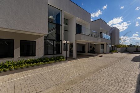 Casa de condomínio para alugar com 350m², 4 quartos e 4 vagasFachada Interna