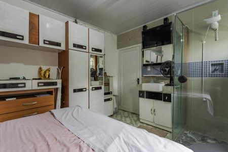 Casa à venda com 200m², 4 quartos e 4 vagas Casa à venda com 200m², 4 quartos e 4 vagasQuarto com banheiro