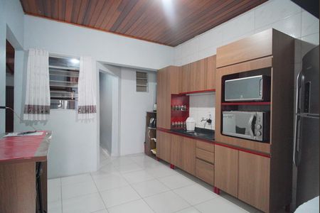 Casa à venda com 150m², 3 quartos e 2 vagas Casa à venda com 150m², 3 quartos e 2 vagasCozinha