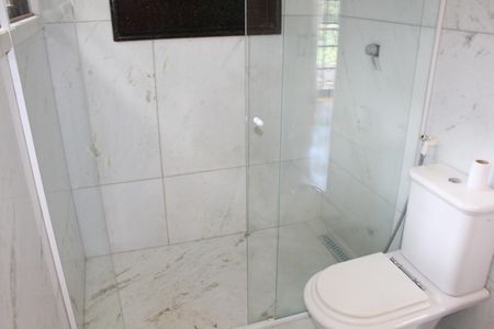 Casa de condomínio para alugar com 750m², 4 quartos e 3 vagasBanheiro da Suíte 1