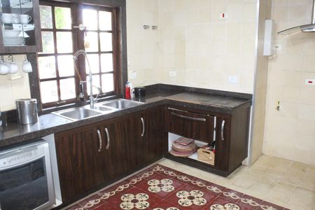 Casa de condomínio para alugar com 750m², 4 quartos e 3 vagasCozinha