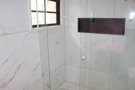 Casa de condomínio para alugar com 750m², 4 quartos e 3 vagasBanheiro da Suíte 1