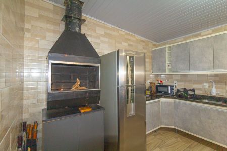 Casa de condomínio à venda com 91m², 2 quartos e 2 vagasCozinha e Área de Serviço