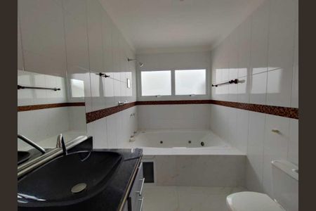 Casa de condomínio à venda com 333m², 4 quartos e 5 vagasBanheiro Suíte