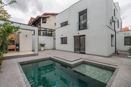 Casa de condomínio à venda com 257m², 4 quartos e 4 vagasQuintal