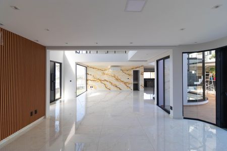 Casa de condomínio à venda com 450m², 4 quartos e 4 vagasSala