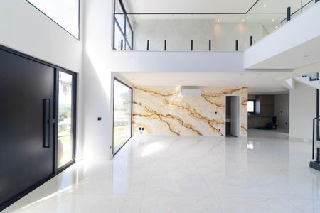 Casa de condomínio à venda com 450m², 4 quartos e 4 vagasSala