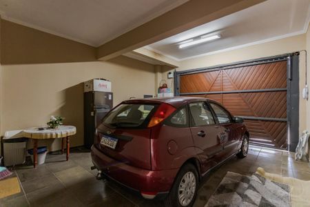 Casa à venda com 376m², 5 quartos e 4 vagas Casa à venda com 376m², 5 quartos e 4 vagasGaragem