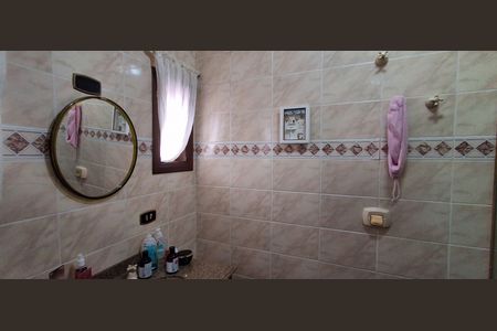 Casa à venda com 350m², 4 quartos e 4 vagasBanheiro Suíte 2