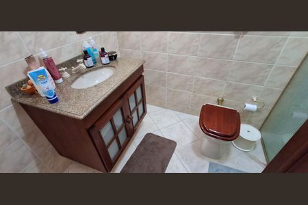 Casa à venda com 350m², 4 quartos e 4 vagasBanheiro Suíte 2