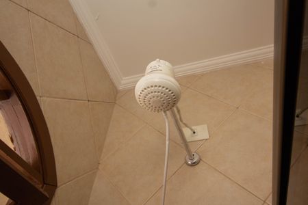 Casa à venda com 180m², 2 quartos e 2 vagasBanheiro da Suíte 1