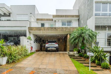 Casa de condomínio à venda com 196m², 3 quartos e 4 vagas Casa de condomínio à venda com 196m², 3 quartos e 4 vagasFachada