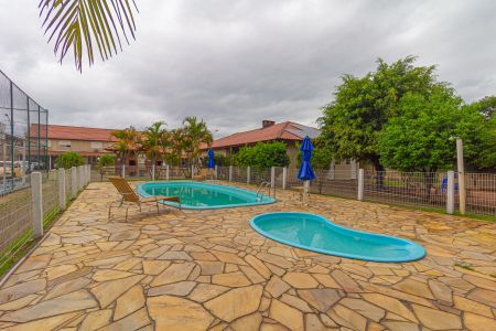 Casa de condomínio à venda com 70m², 2 quartos e 2 vagasÁrea comum - Piscina
