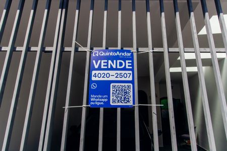 Casa à venda com 129m², 3 quartos e 2 vagas Casa à venda com 129m², 3 quartos e 2 vagasFachada e placa