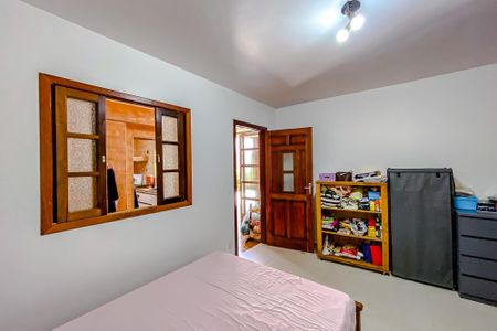 Casa à venda com 411m², 5 quartos e 6 vagasQuarto 2 (Casa 2)
