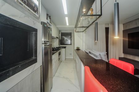 Apartamento à venda com 58m², 2 quartos e 2 vagas Apartamento à venda com 58m², 2 quartos e 2 vagasCozinha e Área de Serviço