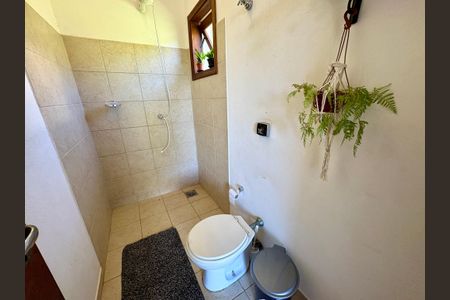 Casa de condomínio à venda com 460m², 4 quartos e 4 vagasBanheiro Externo