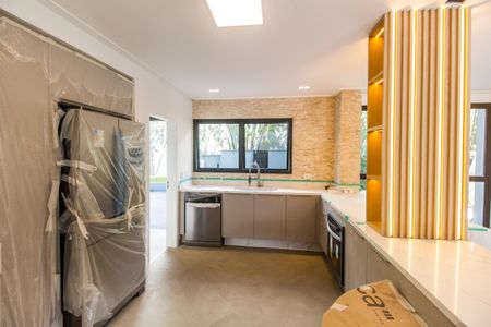 Casa de condomínio à venda com 598m², 4 quartos e 4 vagas Casa de condomínio à venda com 598m², 4 quartos e 4 vagasCozinha