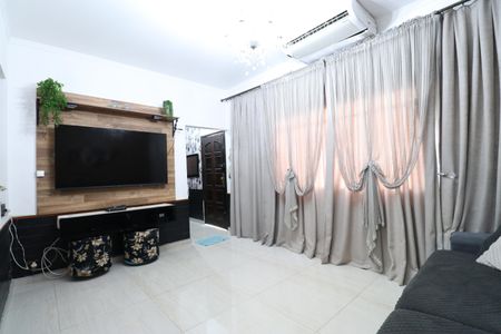 Casa de condomínio à venda com 300m², 4 quartos e 2 vagasSala