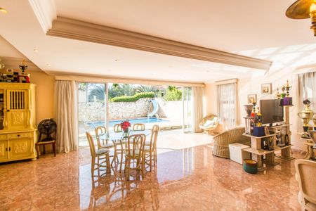 Casa de condomínio para alugar com 480m², 4 quartos e 6 vagasSala de TV