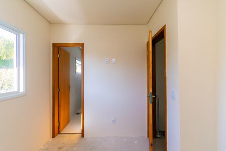 Casa de condomínio à venda com 76m², 2 quartos e 2 vagasSuíte 1