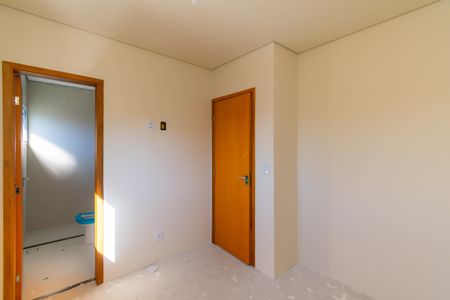 Casa de condomínio à venda com 76m², 2 quartos e 2 vagasSuíte 1