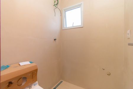 Casa de condomínio à venda com 76m², 2 quartos e 1 vagaBanheiro da Suíte 1