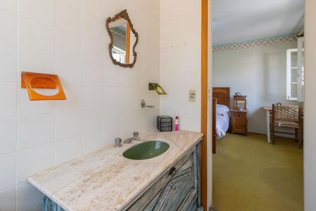 Casa à venda com 250m², 3 quartos e 2 vagas Casa à venda com 250m², 3 quartos e 2 vagasBanheiro da suíte