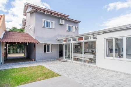 Casa de condomínio à venda com 185m², 3 quartos e 2 vagasQuintal