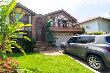 Casa de condomínio à venda com 411m², 7 quartos e 4 vagas Casa de condomínio à venda com 411m², 7 quartos e 4 vagasFachada