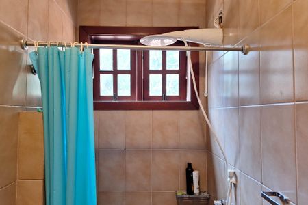 Casa de condomínio à venda com 227m², 4 quartos e 2 vagasBanheiro da Suíte 1