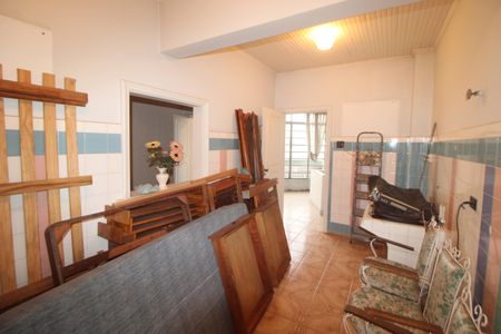 Casa à venda com 265m², 8 quartos e 5 vagasCasa 1 - Área de Serviço