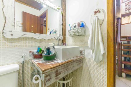 Casa de condomínio à venda com 260m², 3 quartos e 3 vagasBanheiro Social 1