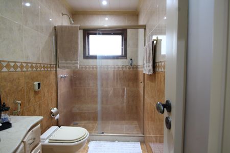 Casa de condomínio à venda com 428m², 4 quartos e 4 vagasBanheiro Social 1