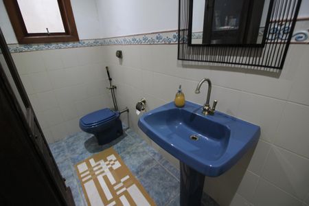 Casa de condomínio à venda com 428m², 4 quartos e 4 vagasLavabo