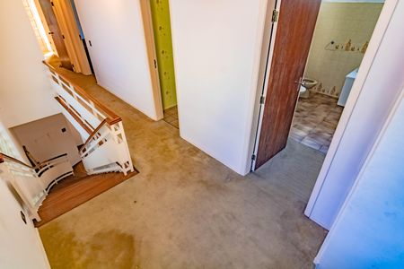 Casa à venda com 300m², 4 quartos e 3 vagasCorredor acesso aos quartos