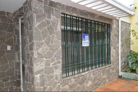 Casa à venda com 217m², 5 quartos e 2 vagasFachada + Plaquinha