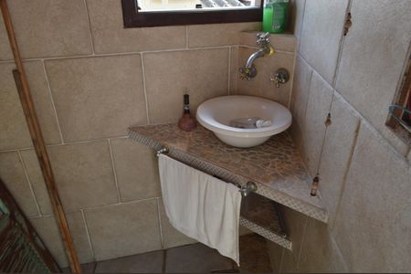 Casa de condomínio à venda com 400m², 3 quartos e sem vagaBanheiro do Terraço