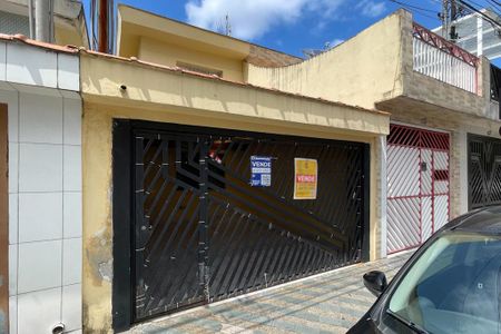 Casa à venda com 125m², 2 quartos e 2 vagas Casa à venda com 125m², 2 quartos e 2 vagasFachada e Placa