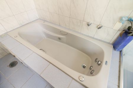 Casa à venda com 267m², 3 quartos e 4 vagasBanheiro Suíte 