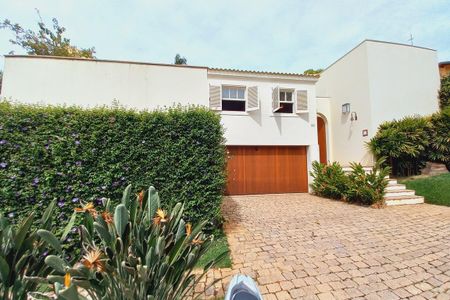 Casa de condomínio à venda com 363m², 4 quartos e 4 vagas Casa de condomínio à venda com 363m², 4 quartos e 4 vagasFachada do Prédio