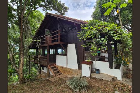 Casa de condomínio para alugar com 100m², 2 quartos e 4 vagasFachada