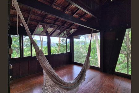 Casa de condomínio para alugar com 100m², 2 quartos e 4 vagasSala