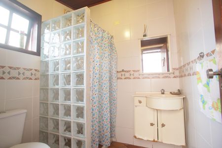 Casa de condomínio à venda com 320m², 6 quartos e 2 vagasBanheiro da Churrasqueira