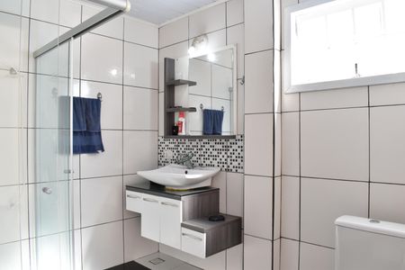 Casa de condomínio para alugar com 300m², 3 quartos e 4 vagasBanheiro da Suíte 4