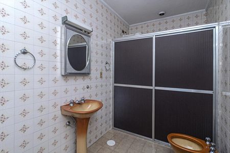 Casa à venda com 321m², 3 quartos e 6 vagasBanheiro da Suíte 1