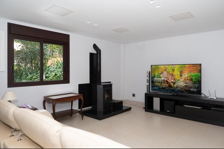 Casa de condomínio à venda com 460m², 4 quartos e 4 vagasSala